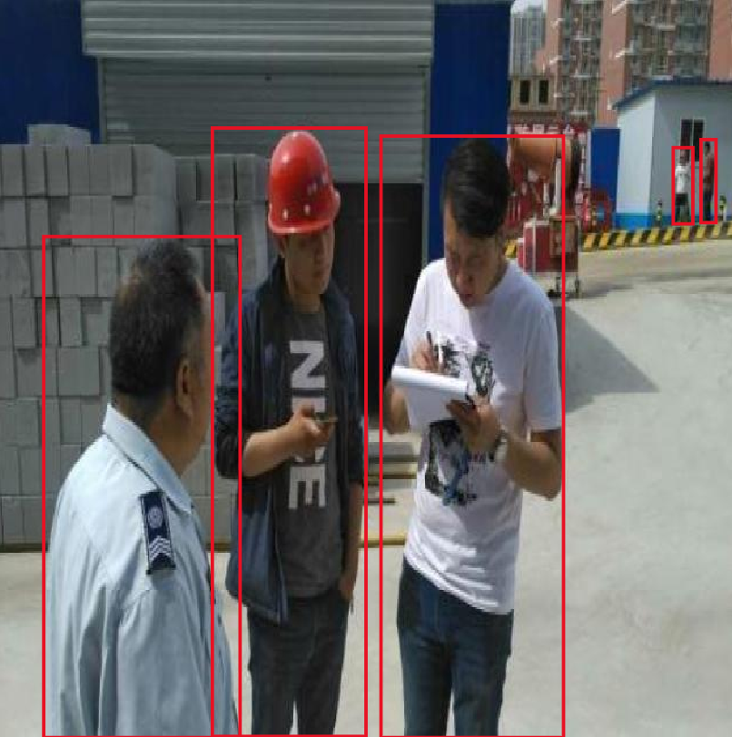 Construction site — workers without safety vests detected (red boxes)